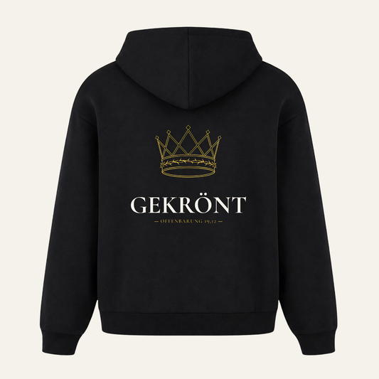 Schwarzer Oversized Hoodie mit goldener Krone und Dornenkranz sowie Schriftzug Gekrönt in Off-White auf dem Rücken, Offenbarung 19,12, Bulletproof Faith