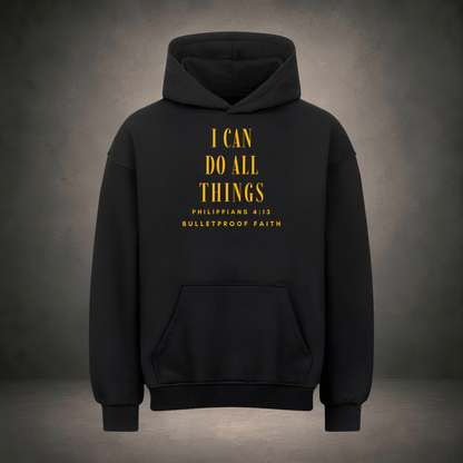 I Can Do All Things Premium Oversized Hoodie in Schwarz, Frontansicht mit Gold-Print Philipper 4,13
