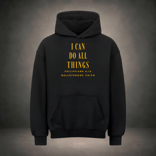 I Can Do All Things Premium Oversized Hoodie in Schwarz, Frontansicht mit Gold-Print Philipper 4,13