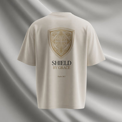 Shield by Grace Oversized T-Shirt mit heraldischem Schild und Psalm 28:7 – Bulletproof Faith